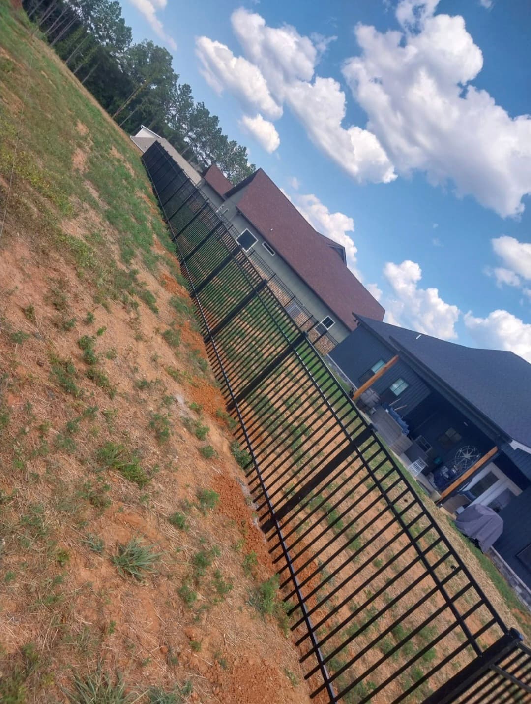 Aluminum fence panel detail showing powder-coated finish