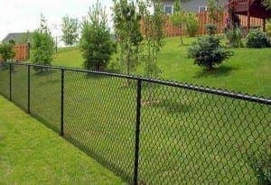 Black vinyl coated chain-link residential fence - Model 503