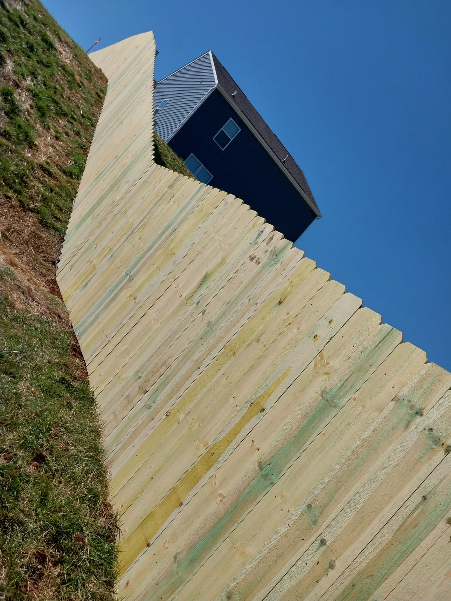 Wood picket fence with gothic tops