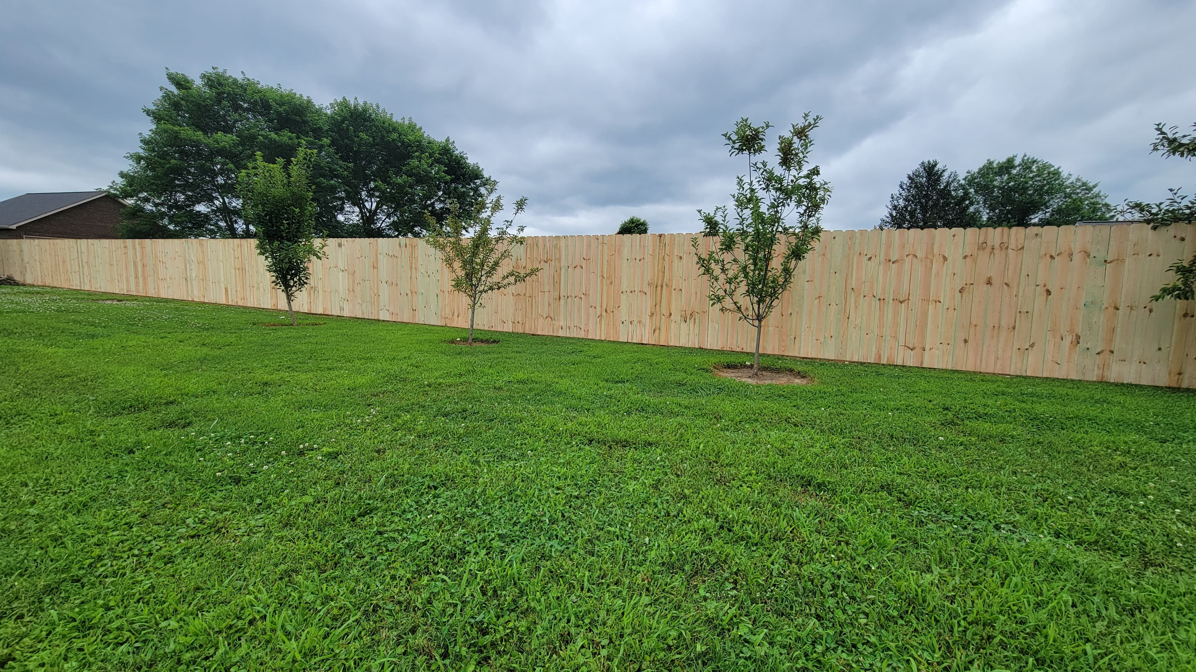 Classic wood privacy fence installation by Southern Fence Knox